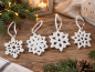 Preview: 4er Set Schneekristalle aus Porzellan – matt weiß, ca. 8 cm