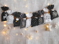 Preview: Adventskalender schwarz weiß gold