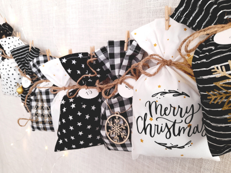 Preview: Adventskalender schwarz weiß gold
